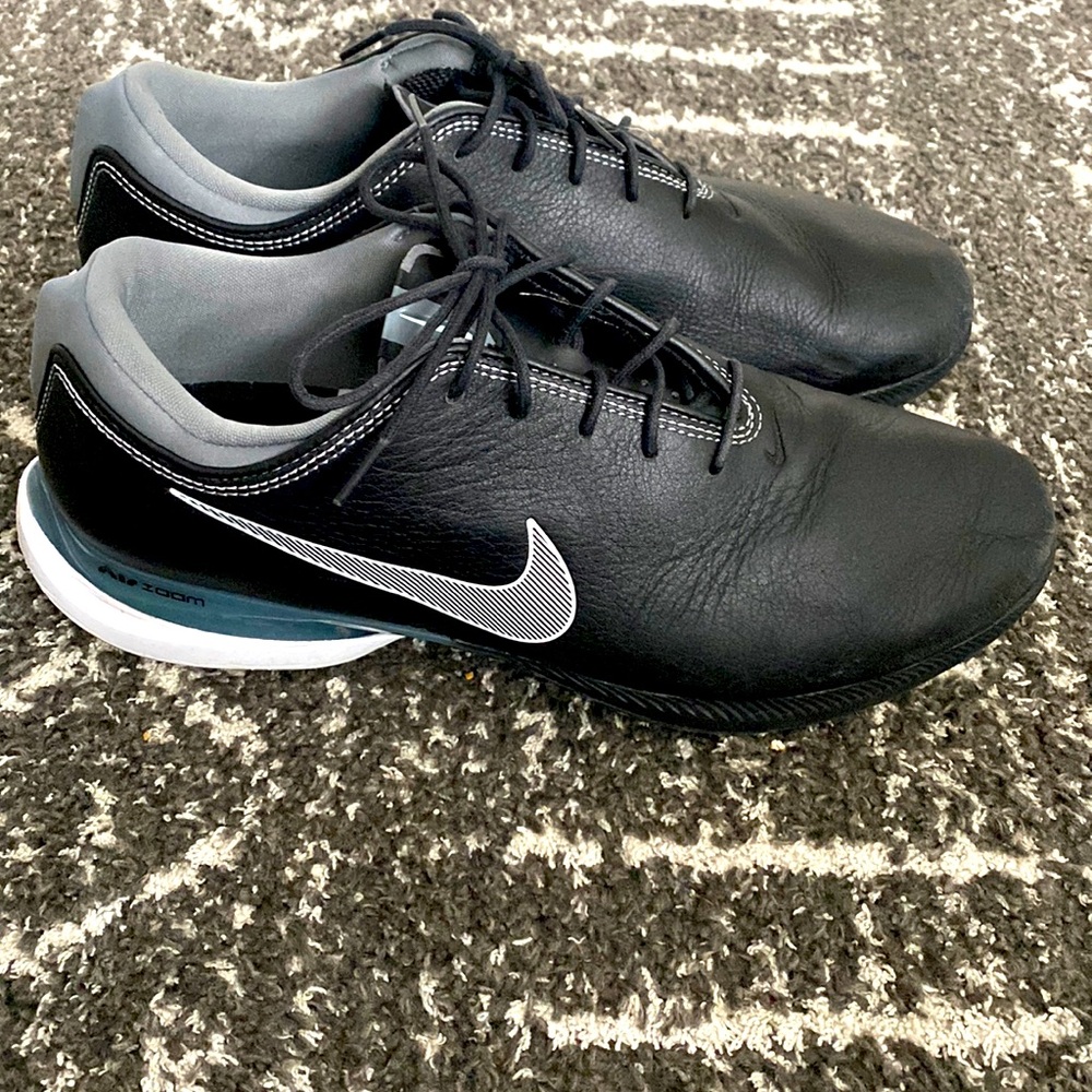 Nike air zoom golf spikes.